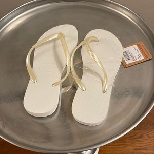 Havaianas flip flops for sale. Great and new with tags! Size 36,white!